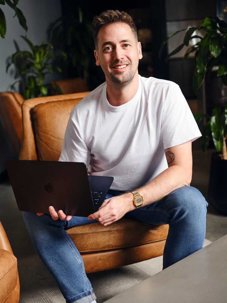 James Fulton working on a laptop
